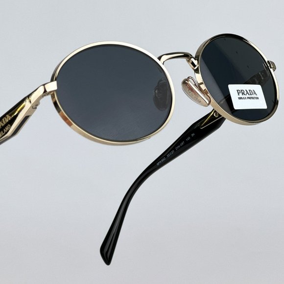 Prada PR65ZS ZVN09T Sunglasses Pale Gold Dark Grey Oval Metal Unisex - Picture 1 of 15